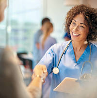 Doctor shaking hands with person Doctor shaking hands with person